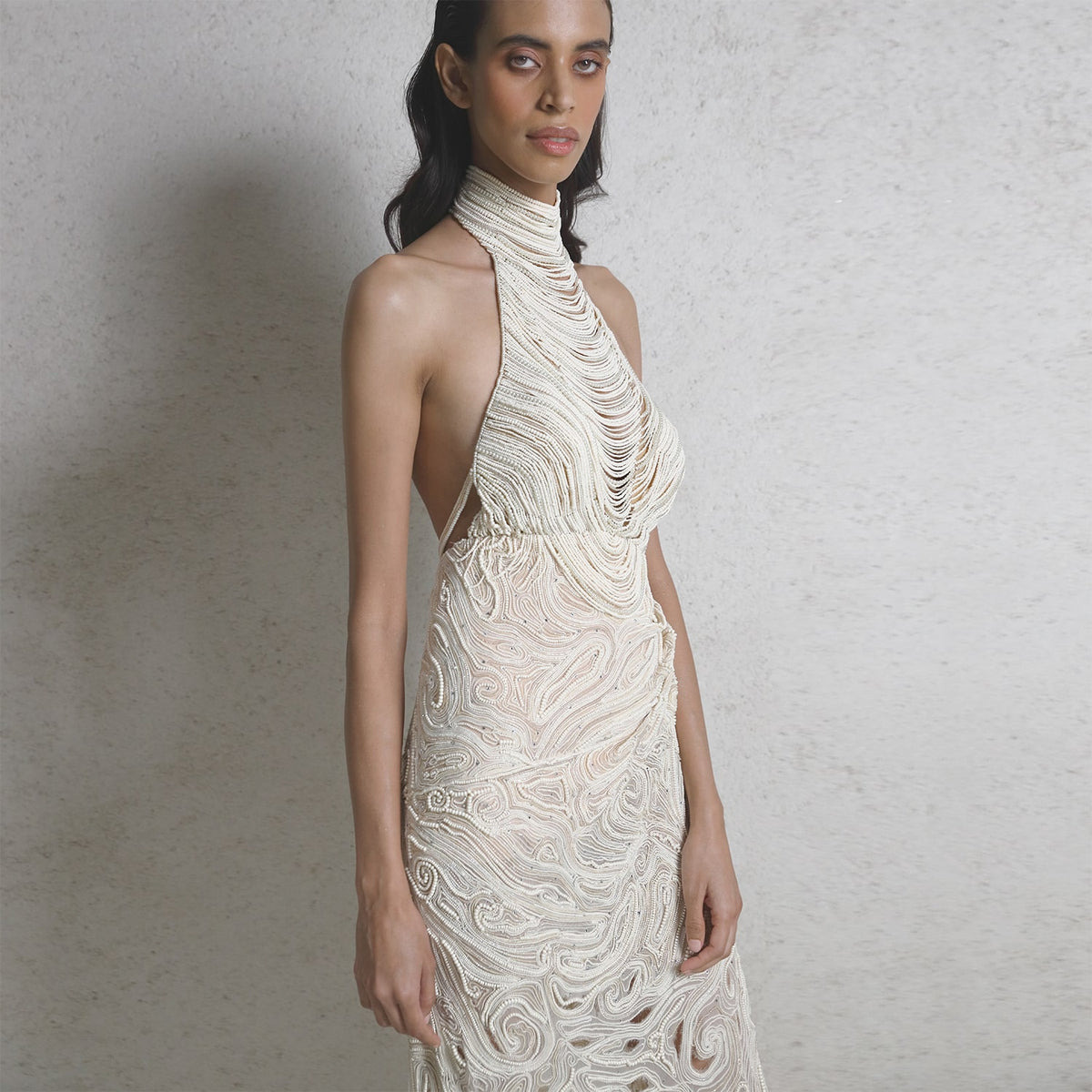 Draped pearl string red carpet gown