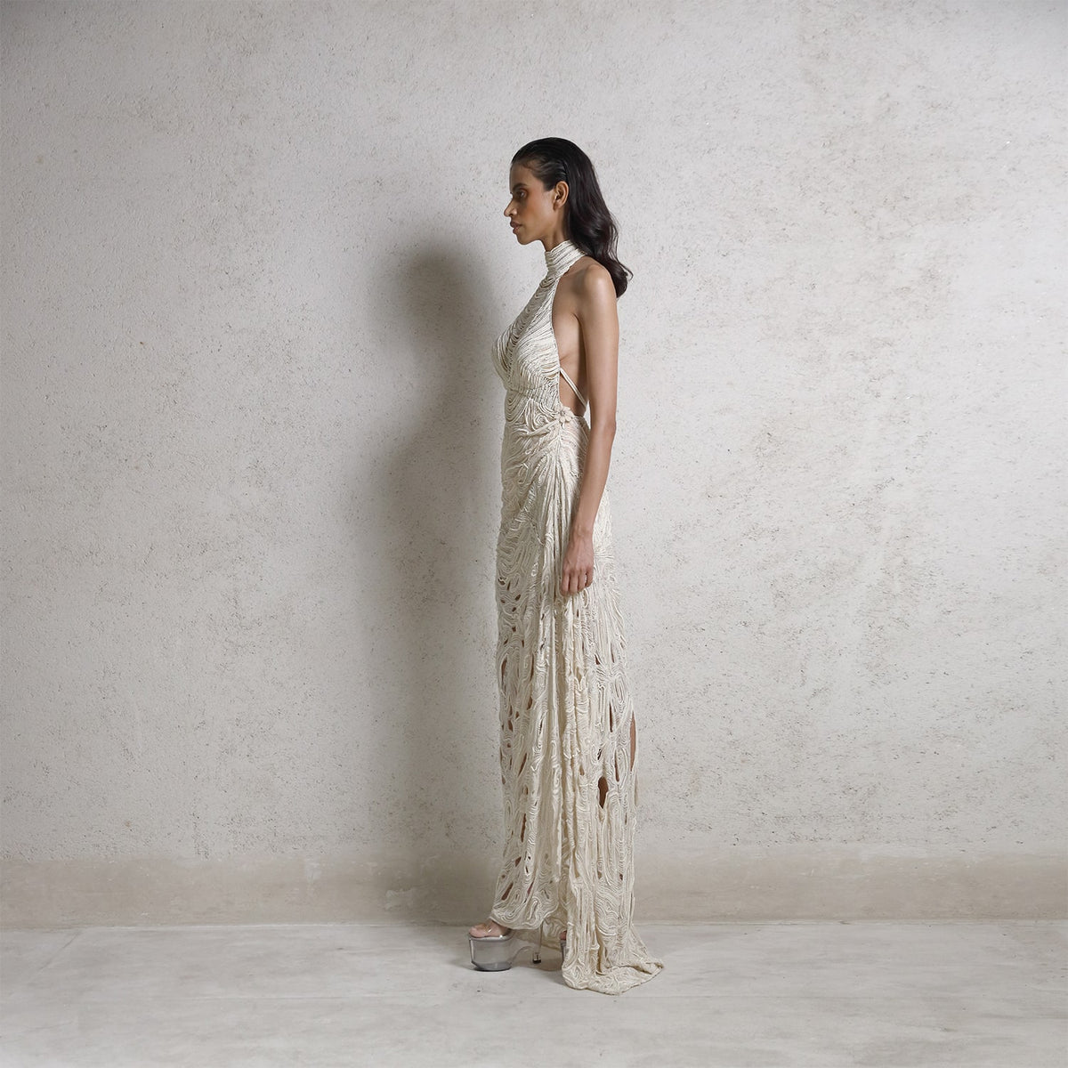 Draped pearl string red carpet gown