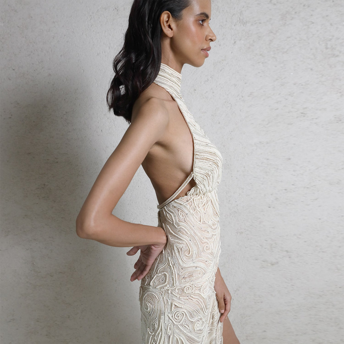 Draped pearl string red carpet gown